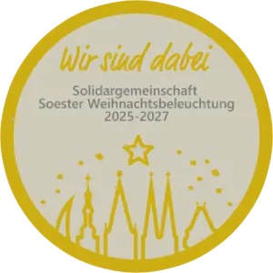 Rundes Siegel mit dem Text 'Wir sind dabei' und dem Hinweis auf die Solidargemeinschaft Soester Weihnachtsbeleuchtung 2025-2027.